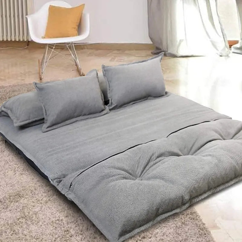 Fauteuil-lit réglable, ergonomique et recouvert de tissu