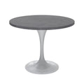 Table de salle à manger avec plateau rond sur pied central en acier blanc
