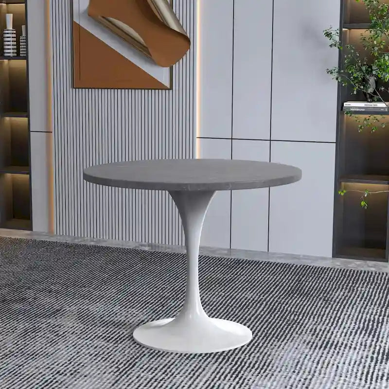 Table de salle à manger avec plateau rond sur pied central en acier blanc