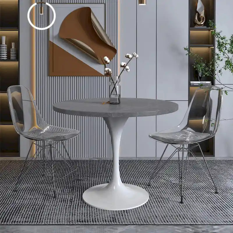 Table de salle à manger avec plateau rond sur pied central en acier blanc